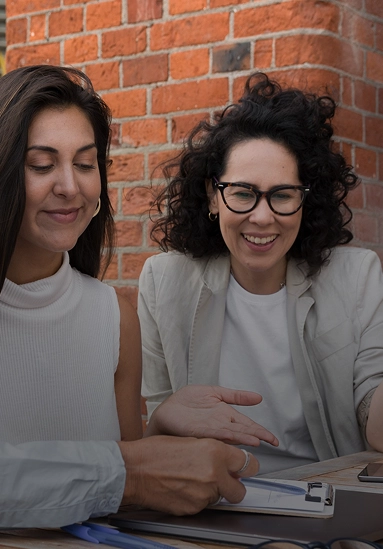 Two women engaged in discussion